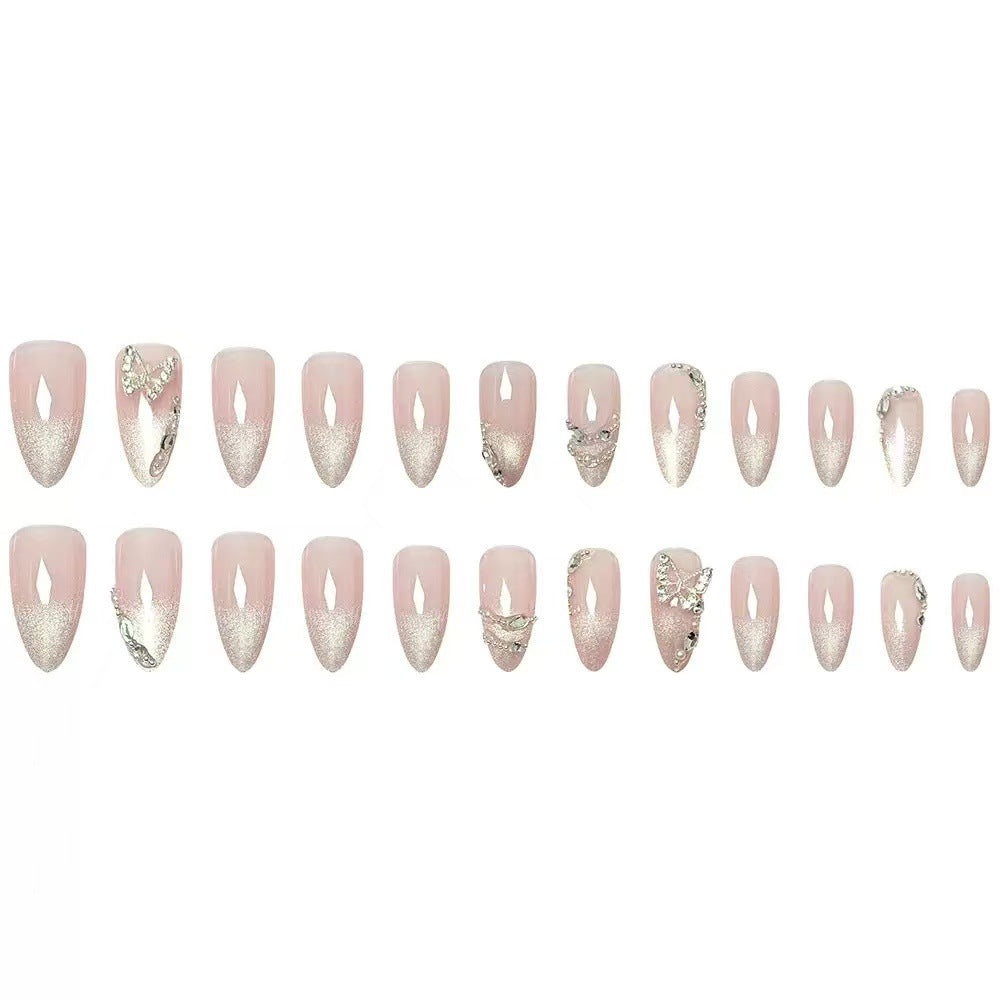 Artistic Stiletto Nail Extensions with Rhinestone Accents Bowlift