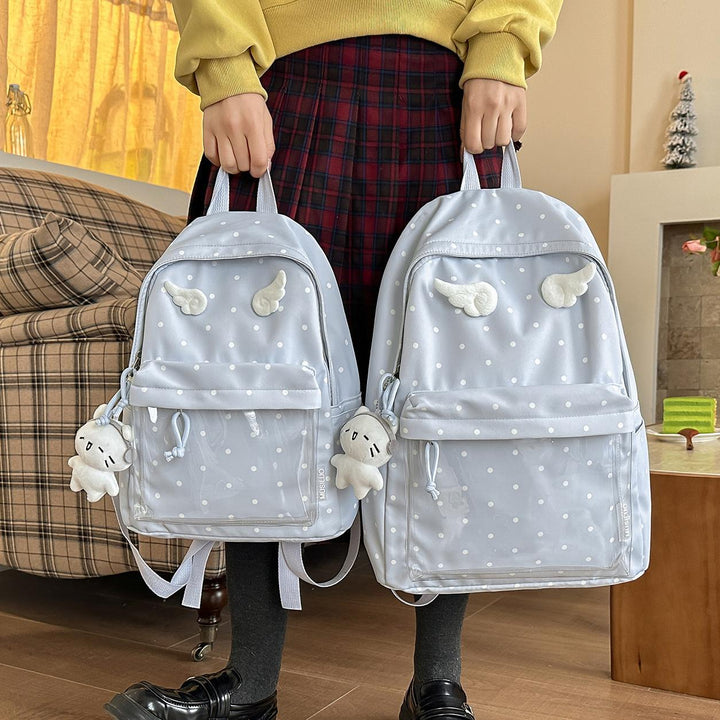 Polka Dot Patterned Backpack with Playful Wing Accents Bowlift