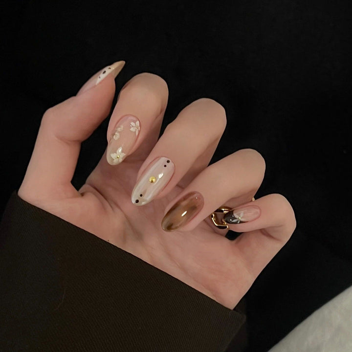 Artificial Nails in Elegant Pastel Look with Floral Accents Bowlift