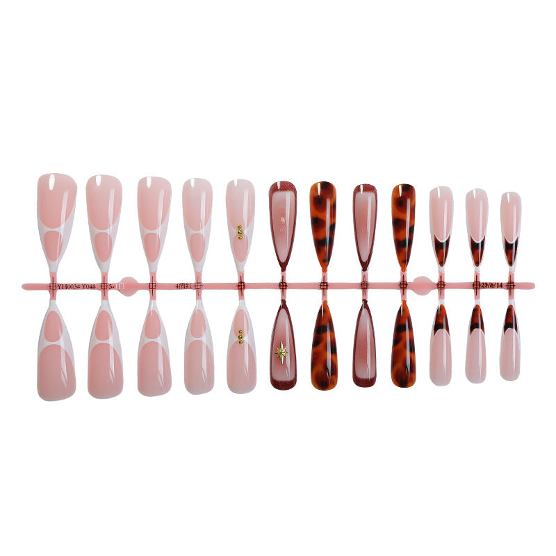 Artistic Press-On Nail Set with Unique Tortoiseshell and Subtle Floral Designs Bowlift