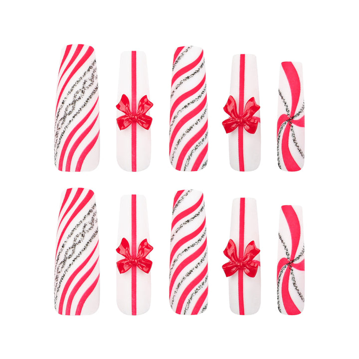 Artful Nail Art with Festive Bows and Christmas Motifs Bowlift