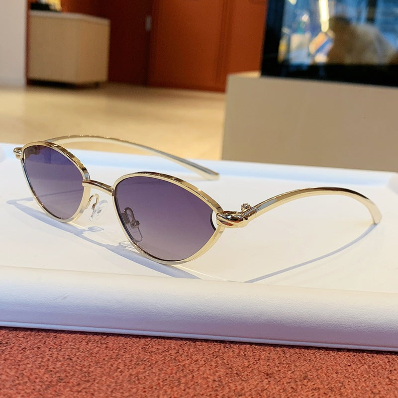 Women's designer sunglasses with elegant metal frame and protective lenses Bowlift