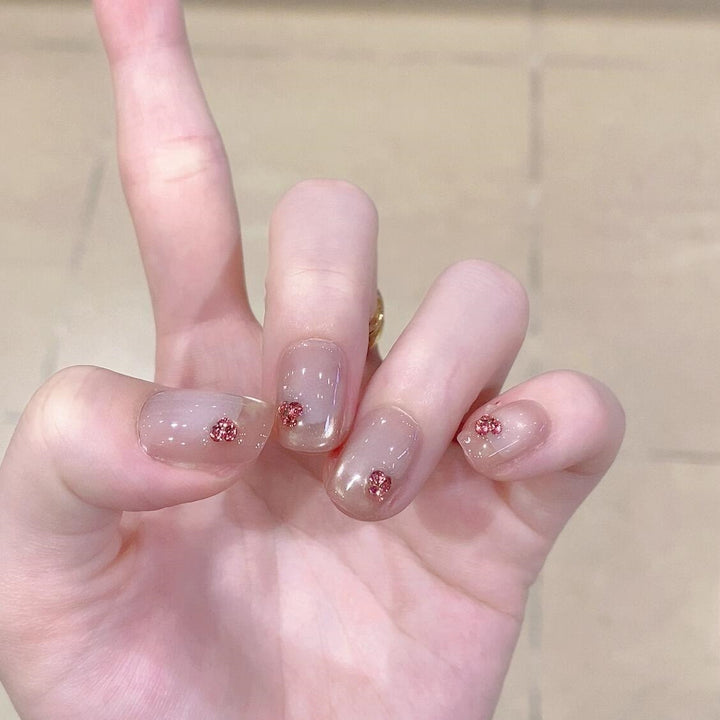 Artificial nails with elegant glitter details Bowlift