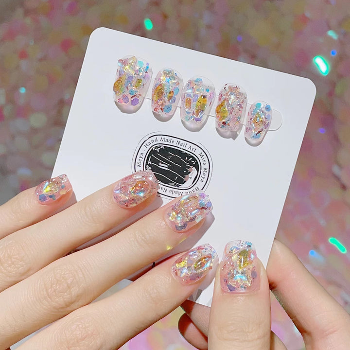 Artful nail tips with glitter accents Bowlift