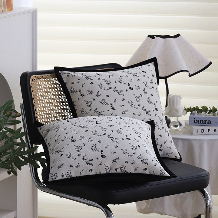 Square decorative cushion cover with subtle floral jacquard texture and elegant piping Bowlift