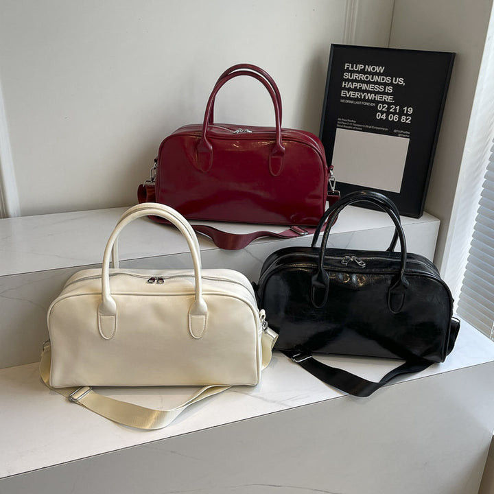 Elegant and Spacious Weekend Bag Made of High-Quality Synthetic Leather Bowlift