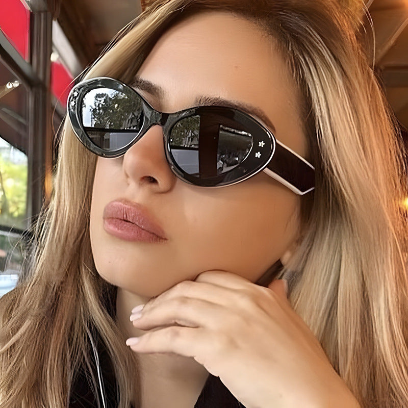 Ladies Cat-Eye Sunglasses with Luxurious Plastic Frame and Decorative Accents Bowlift
