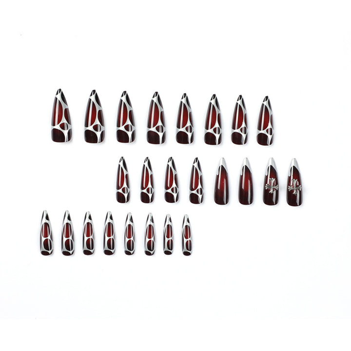 Artful Stiletto Nails with Elegant Cross Decoration Bowlift