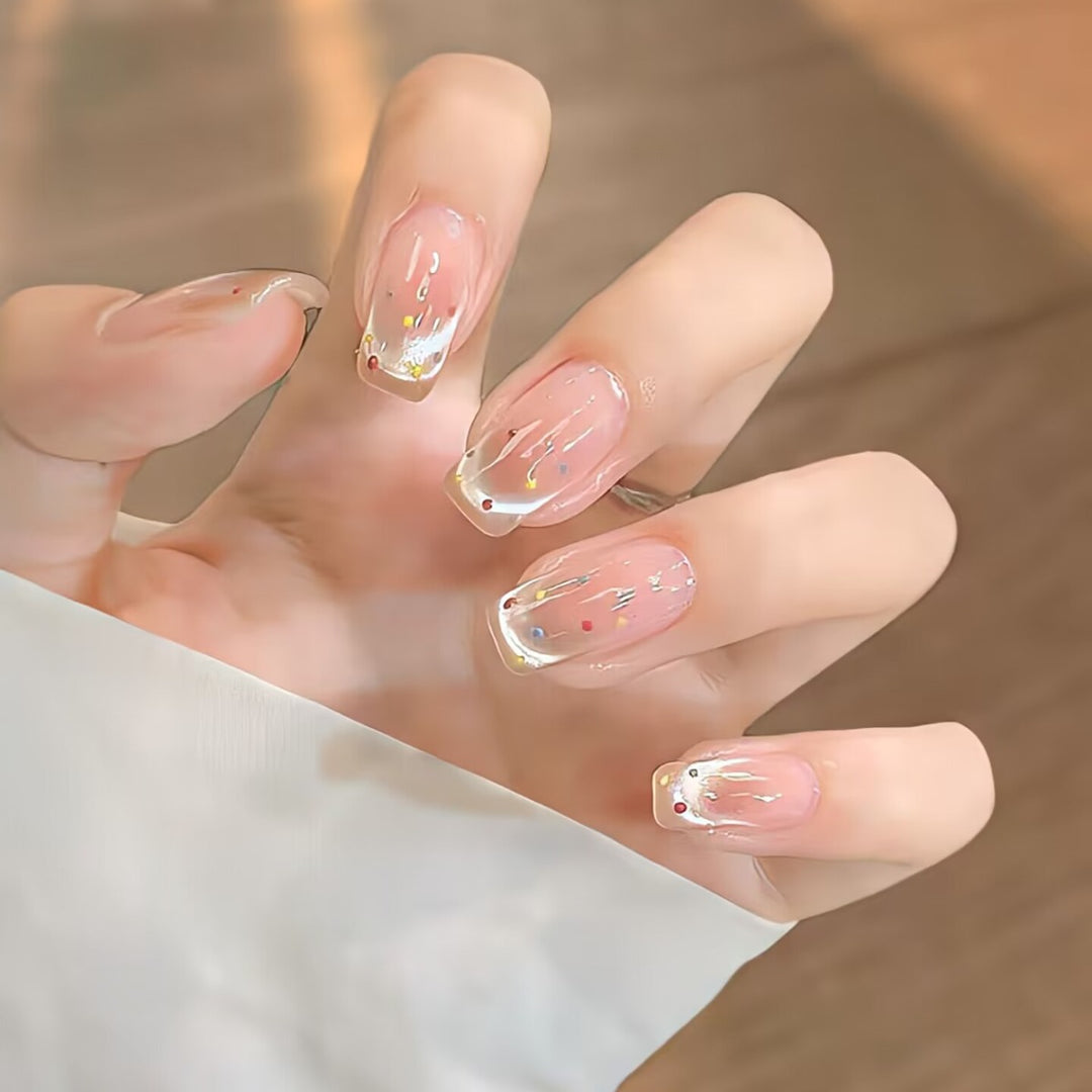 Trendy artificial nails with glitter effects Bowlift
