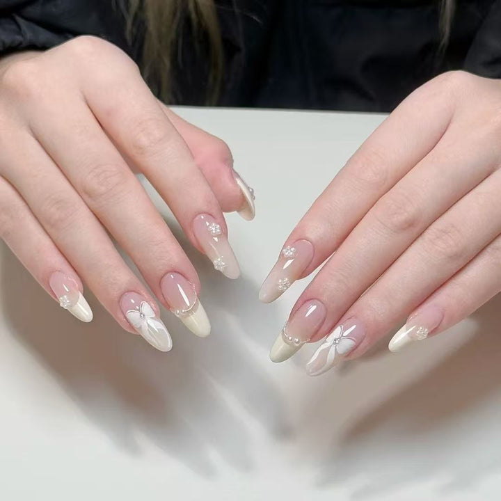 Artistic Almond-Shaped Press-On Nail Set with Elegant Floral Accents Bowlift