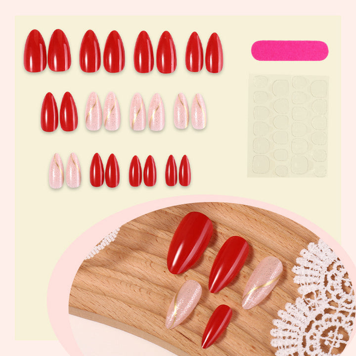 Artificial nail set with shiny red surface and stylish accents Bowlift