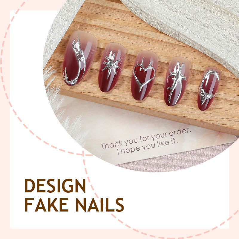 Artificial nail set with elegant glitter accents and floral details Bowlift