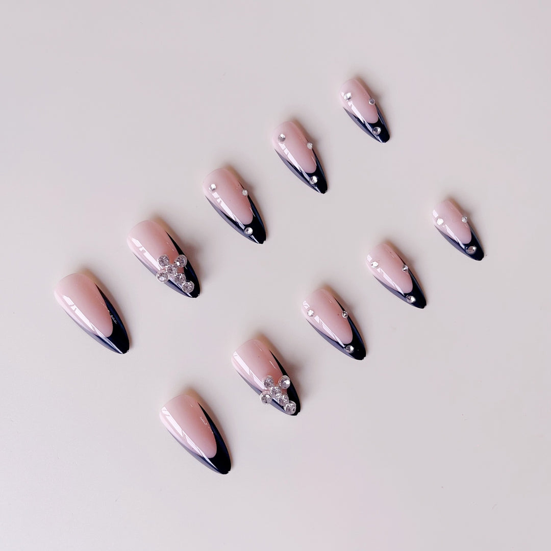 Artificial nail set with luxurious French design and radiant accents Bowlift