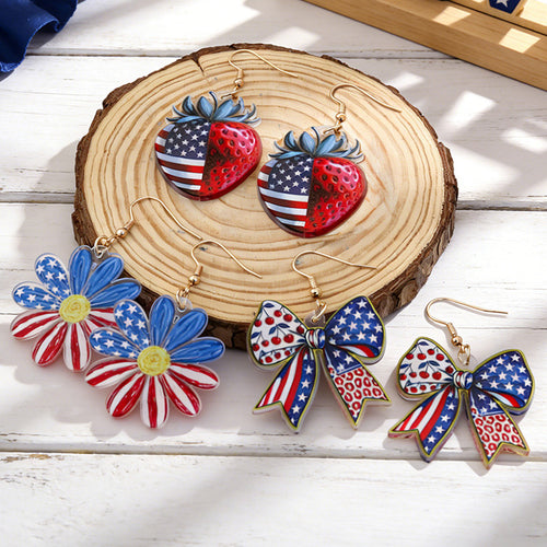 Women's eye-catching statement earrings made of acrylic with patriotic bow pendant Bowlift