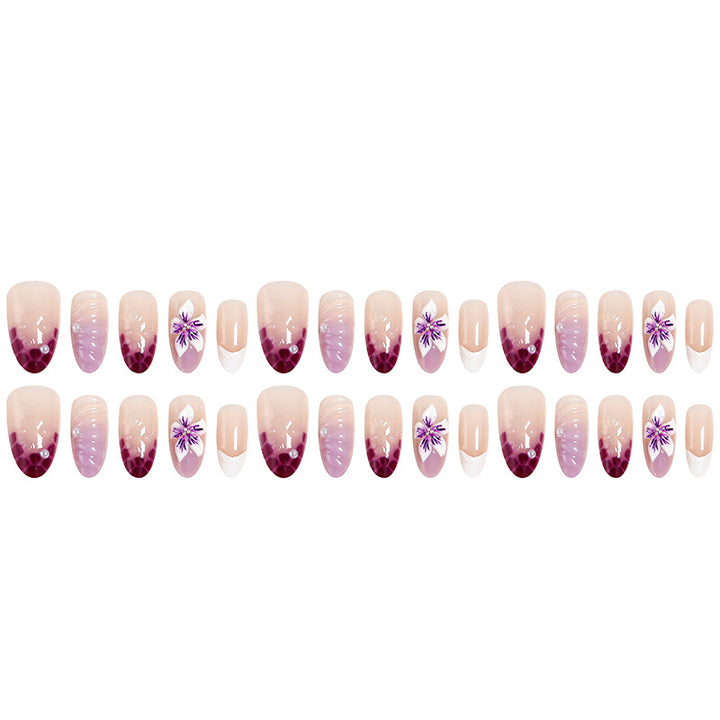 Artificial nail set with elegant ombre design and floral accents Bowlift