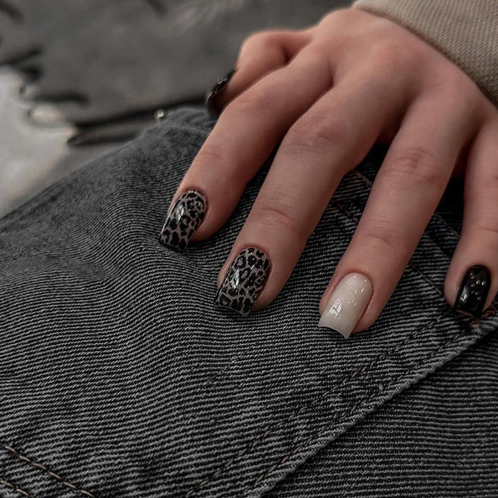 Acrylic nail set with stylish leopard pattern and elegant accents Bowlift