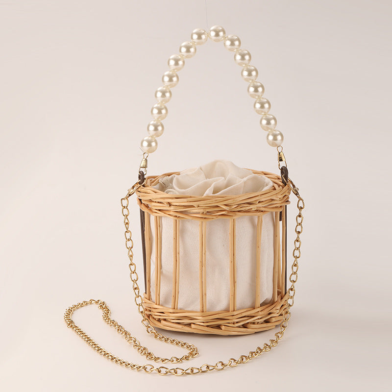 Women's elegant basket bag with pearl chain Bowlift