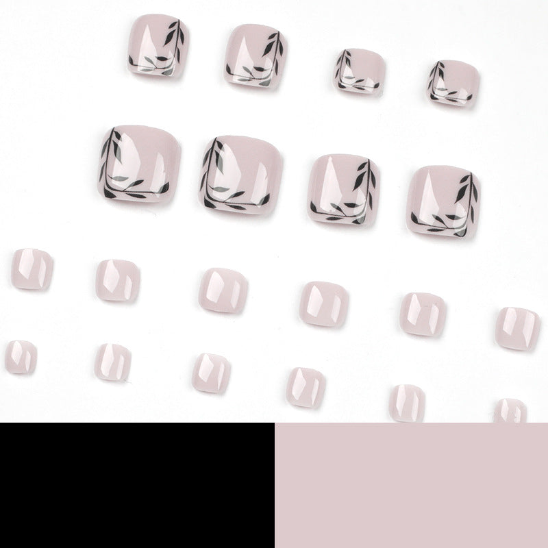 Artful toenail art with delicate leaf motifs Bowlift