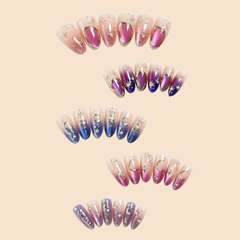 Glamorous artificial nails with star and moon motifs Bowlift