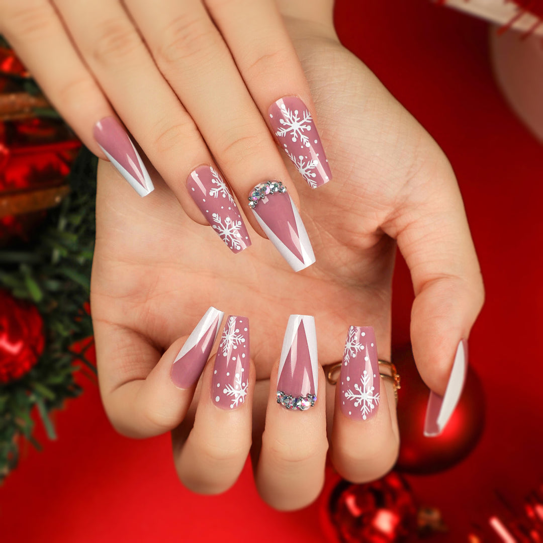 Artistic Nail Extensions with Snowflake Design and Glitter Accents Bowlift