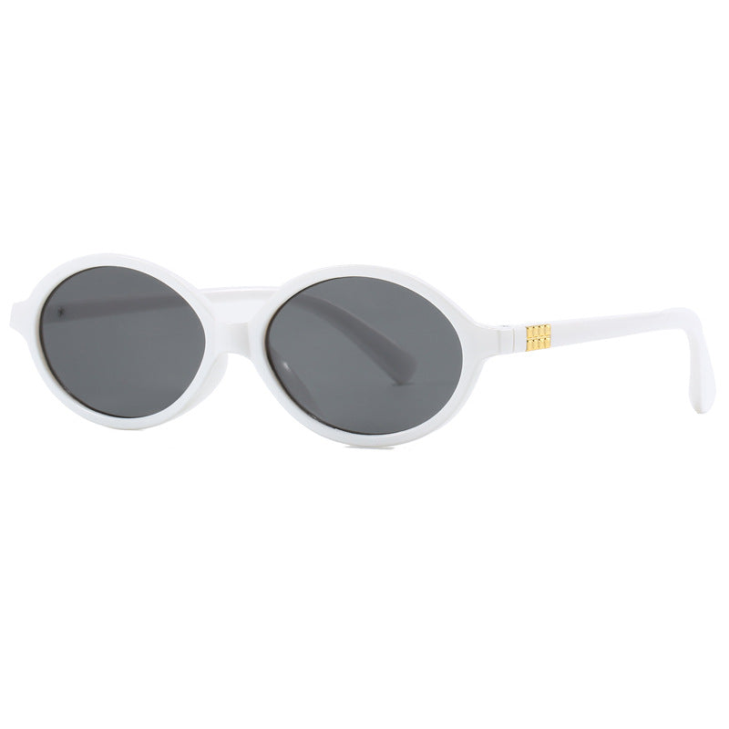 Women's fashionable sunglasses with oval frame and golden accents Bowlift