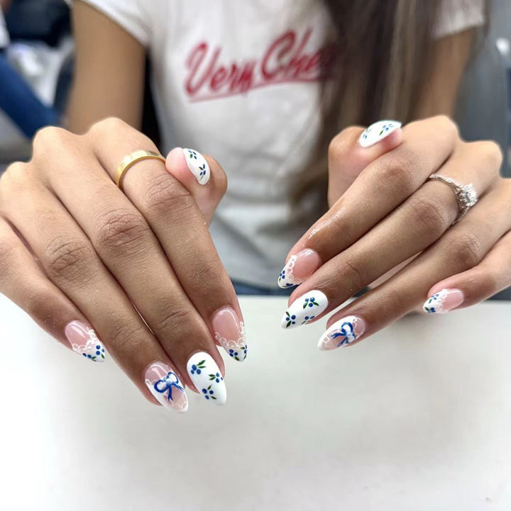 Artificial nails with charming flower and bow decor Bowlift