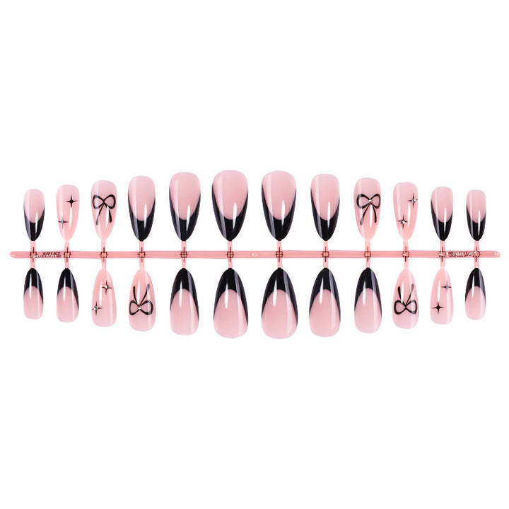 Artificial nail set with elegant cut and bow decorations Bowlift