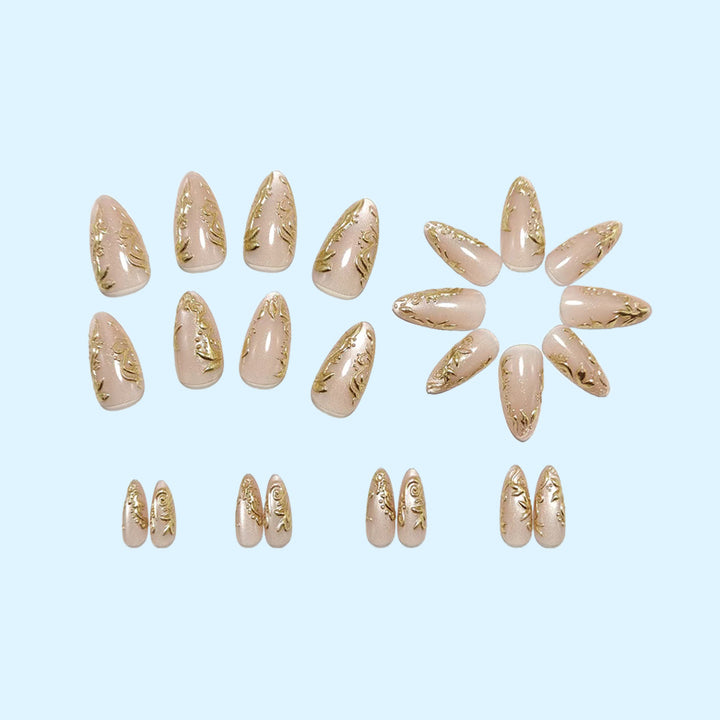 Glamorous artificial nails with delicate gold accents Bowlift