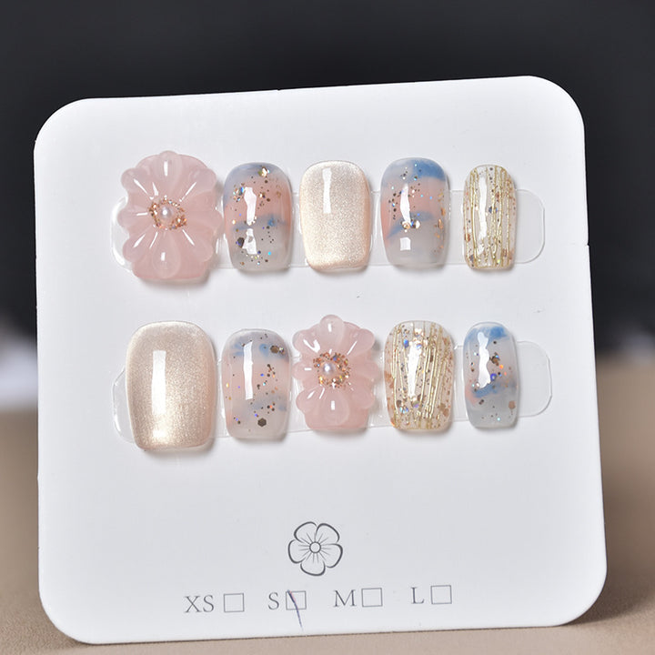 Elegant Nail Art Extensions with Pearl Accents Bowlift