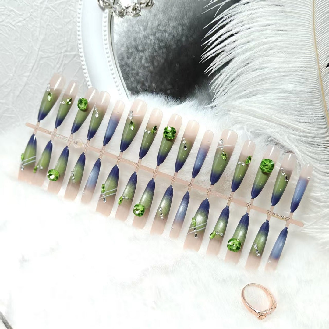 Artificial nails with elegant gradient color and glitter accents Bowlift