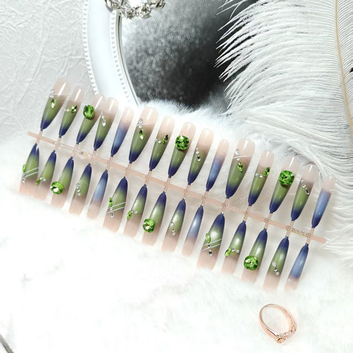 Artificial nails with elegant gradient color and glitter accents Bowlift