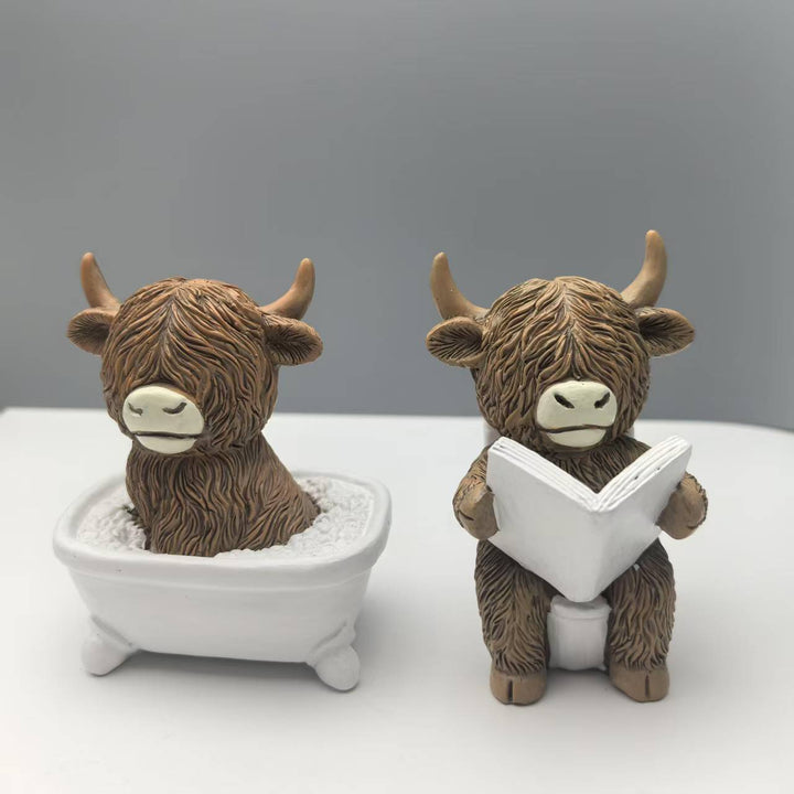 Funny decorative figure of a Highland cow in a bathtub Bowlift