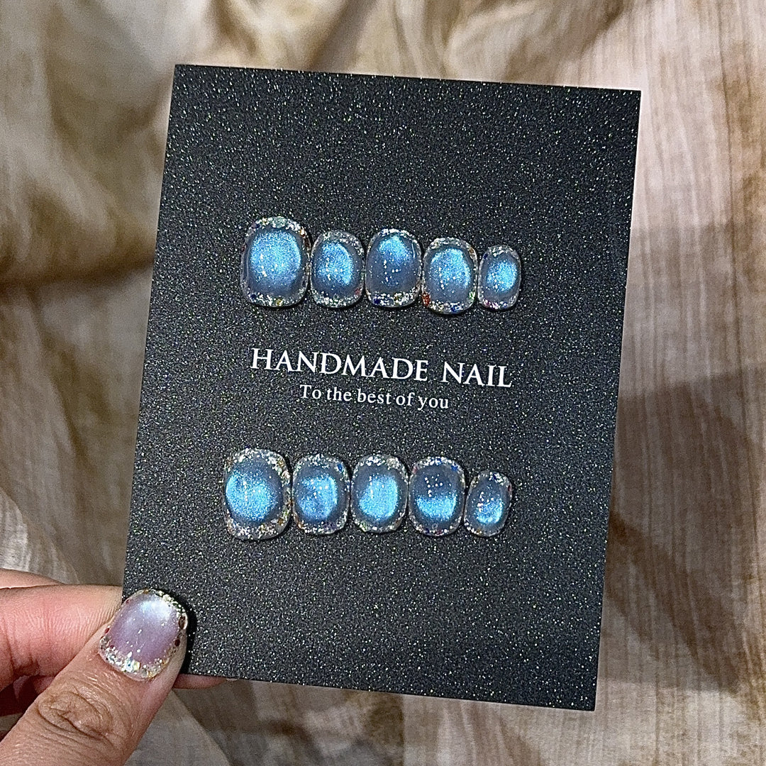Handmade art nails with shimmering effects Bowlift