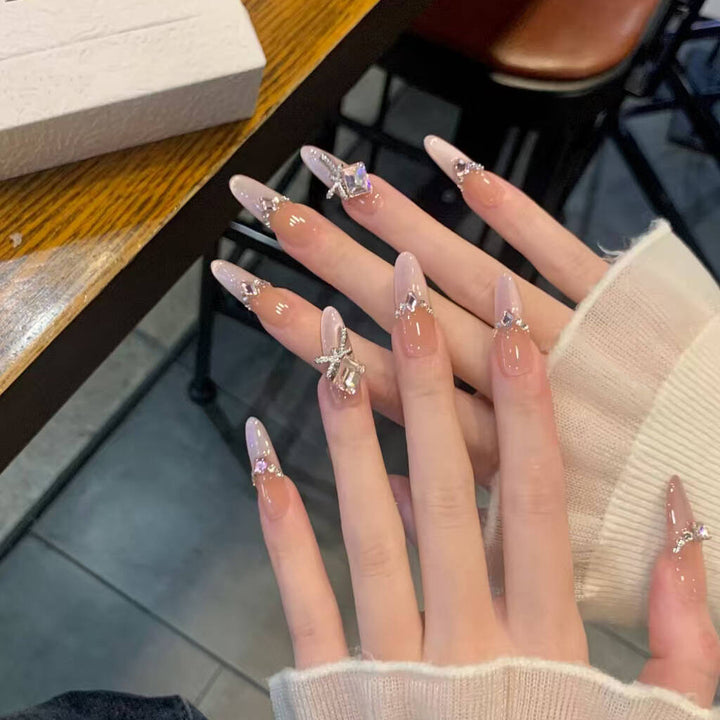 Artistic Nail Design with Decorative Elements Bowlift