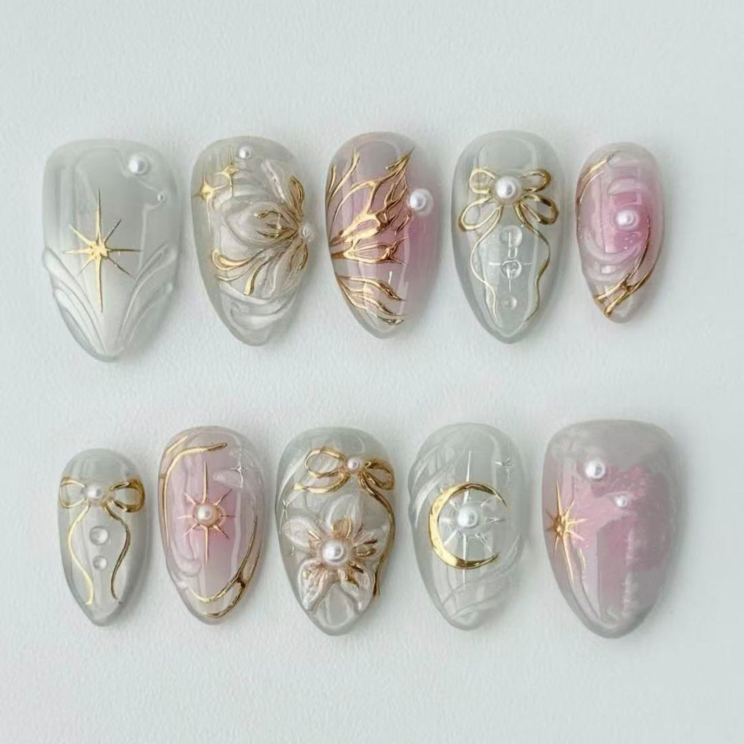 Artificial nail set with filigree golden accents Bowlift