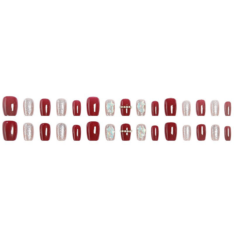 Glamorous artificial nail set with sparkling 3D applications and elegant embellishments Bowlift