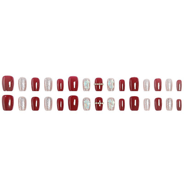 Glamorous artificial nail set with sparkling 3D applications and elegant embellishments Bowlift
