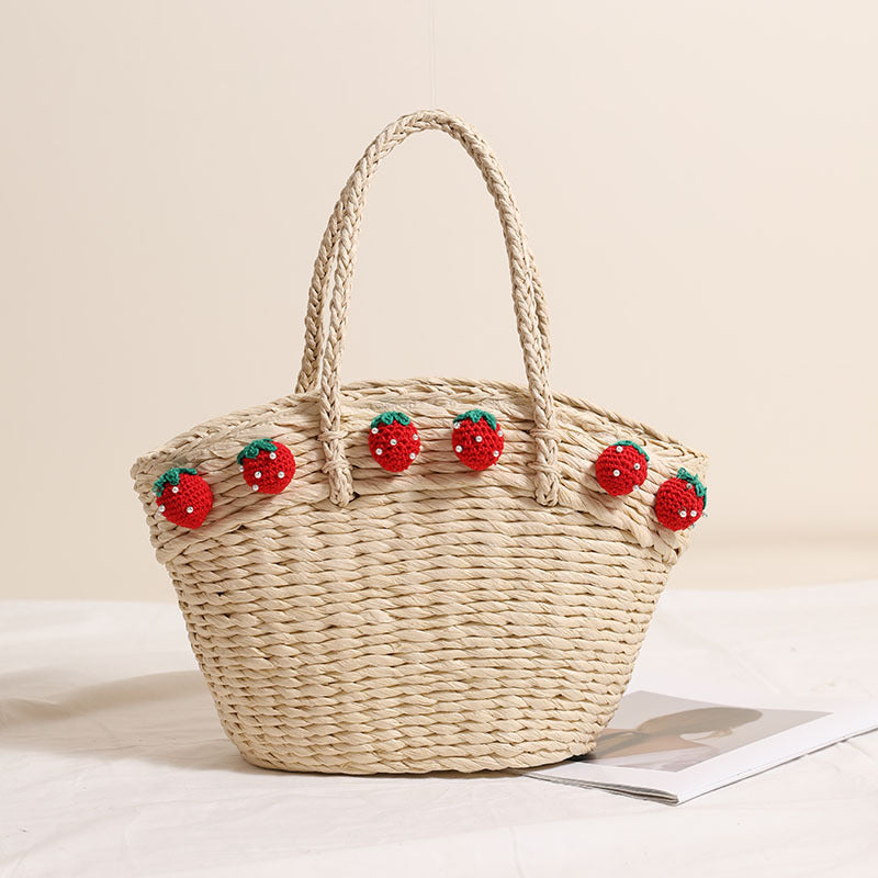 Handmade basket bag with playful strawberry motif Bowlift
