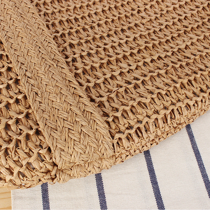 Eco-friendly straw tote bag with elegant tassel detail Bowlift