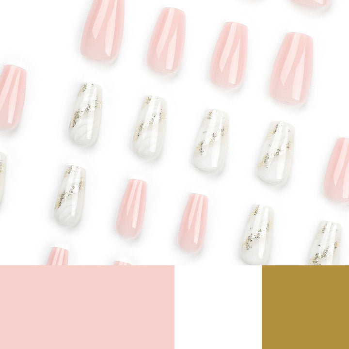 Artistic Nail Extensions with Elegant Gold Design Bowlift