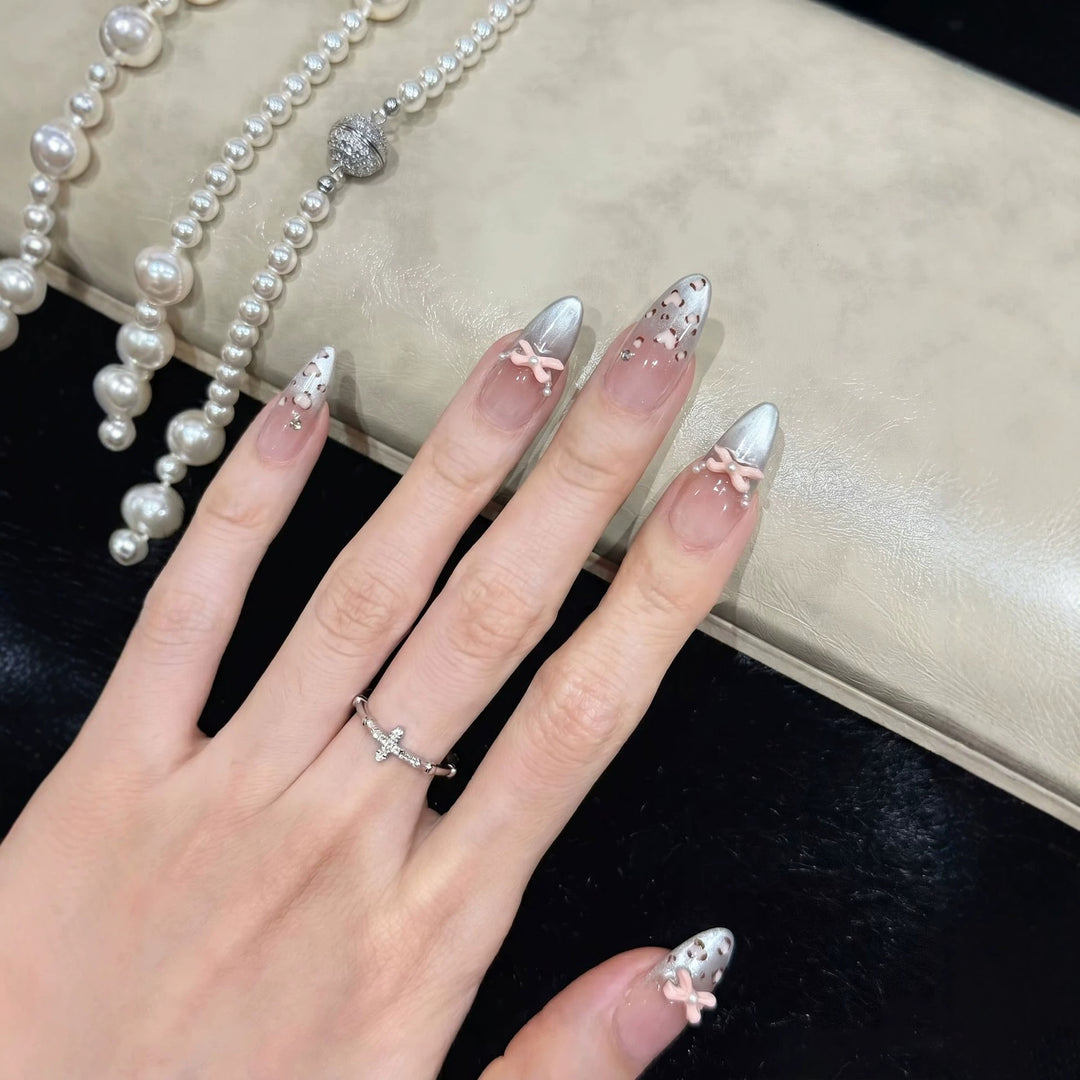 Decorative Press-On Nail Design with Bow Accents Bowlift