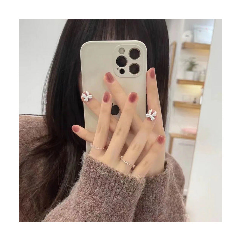 Elegant artificial nails with delicate flower accents Bowlift