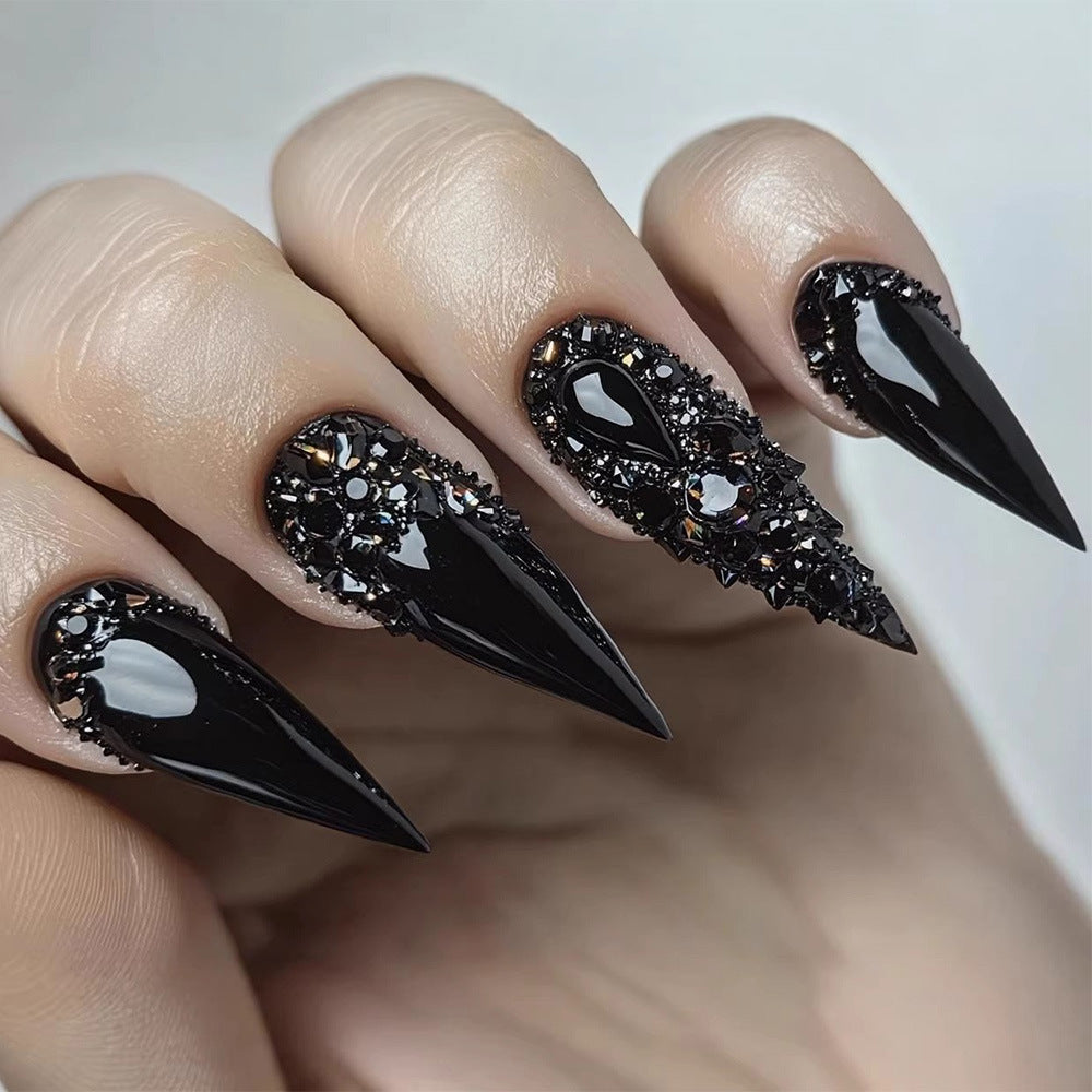 Artificial nails in elegant stiletto design with sparkling rhinestone appliqués Bowlift