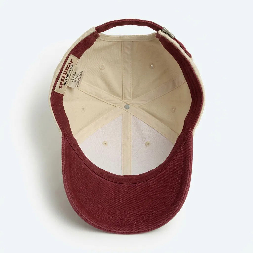 Women's sporty cap with racing motif Bowlift