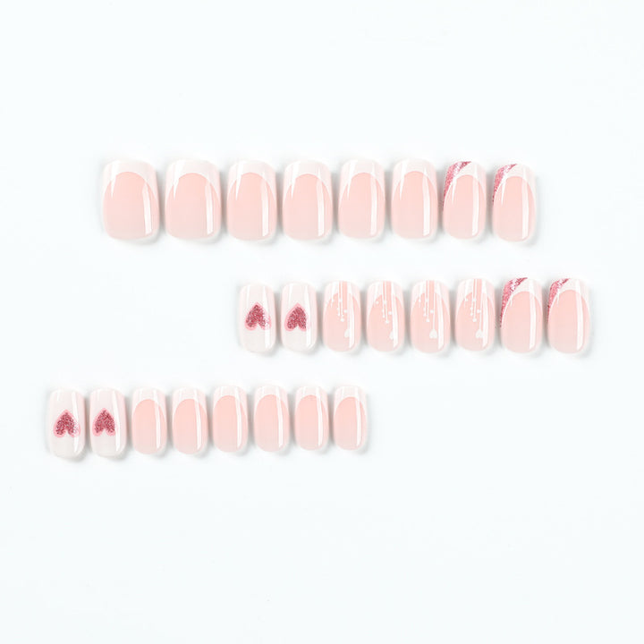 Artful nail designs with heart and glitter accents Bowlift