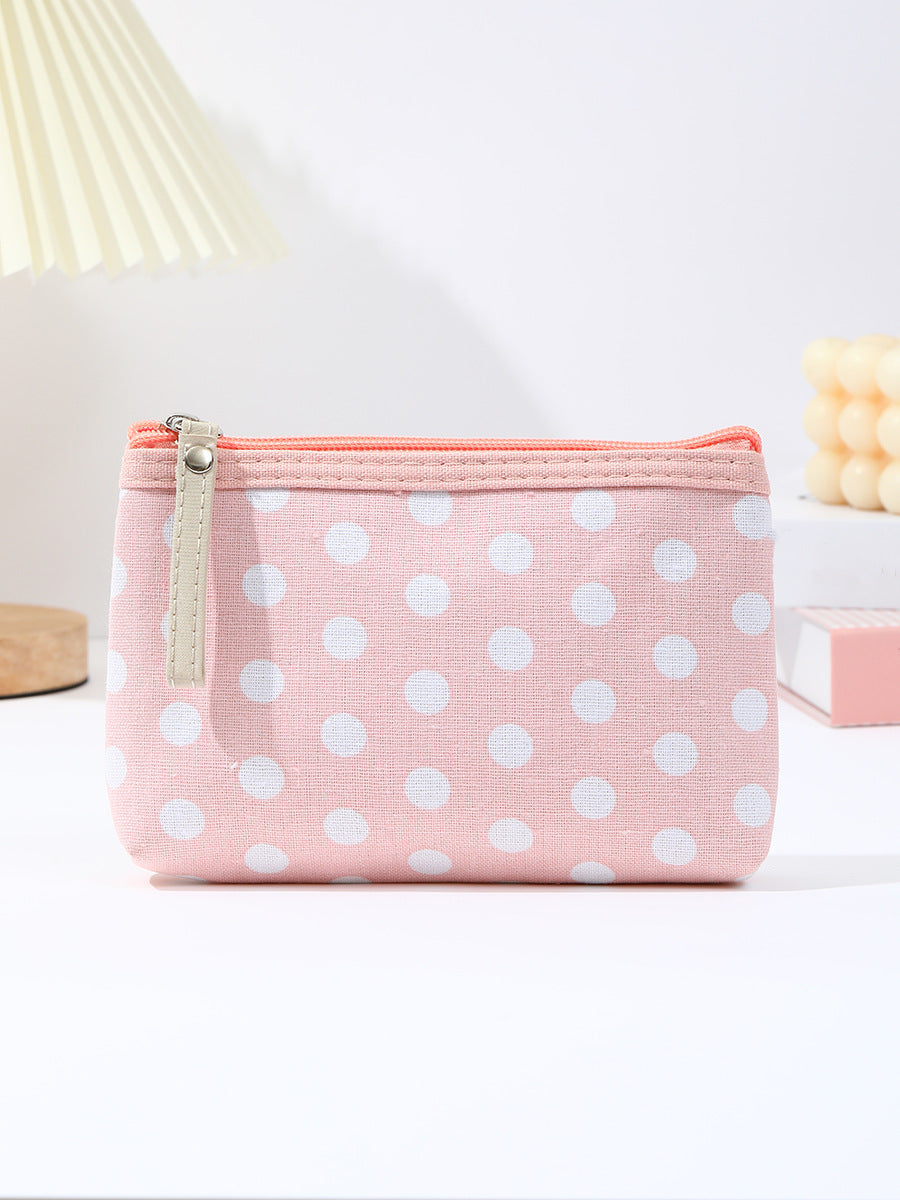 Polka dot canvas cosmetic pouch with top zipper and leather pull Bowlift