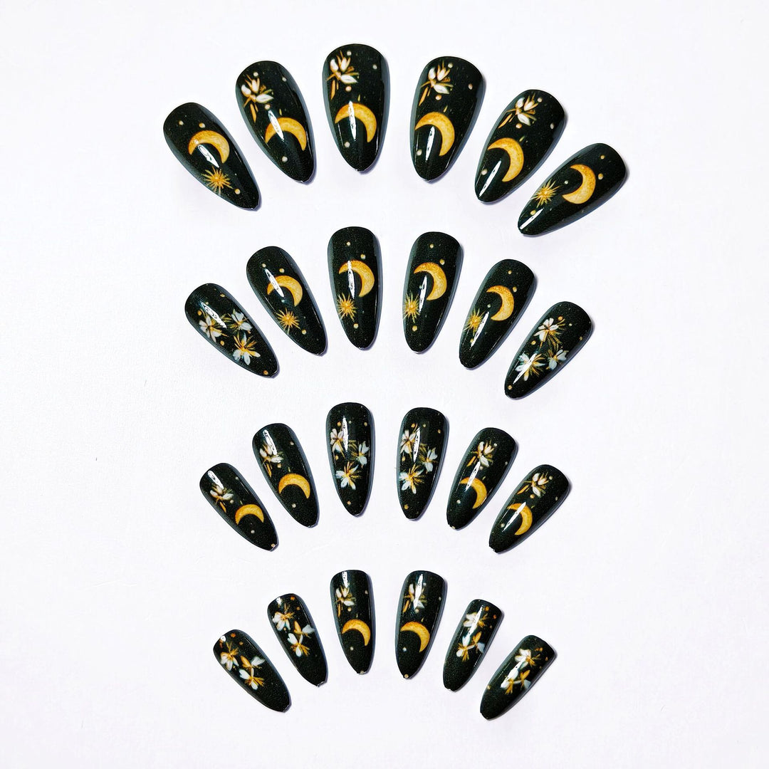 Glamorous artificial nails with moon and flower motifs Bowlift