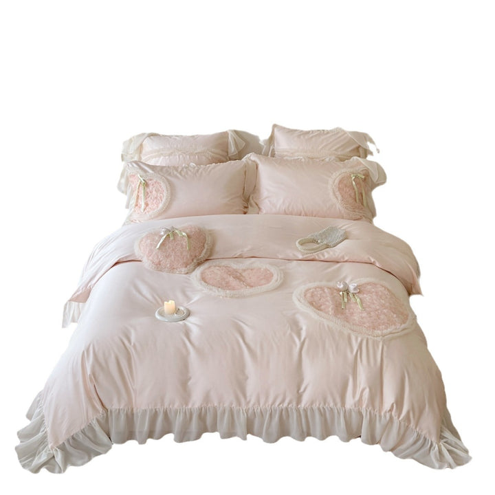 Romantic bedding set with ruffles and heart applications