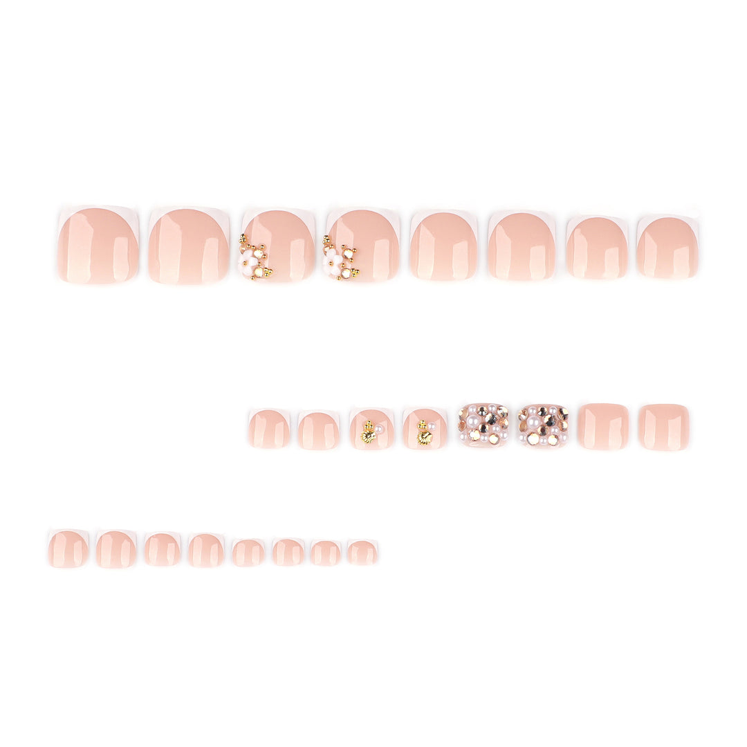 Glamorous toenail art with luxurious rhinestone and floral designs Bowlift