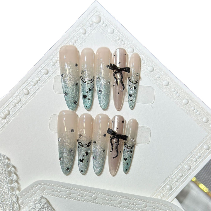 Elegant Stiletto Press-On Nail Set with Rhinestone and Bow Accents Bowlift